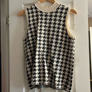 Ann Taylor Loft black checkered sweater vest, size medium.
